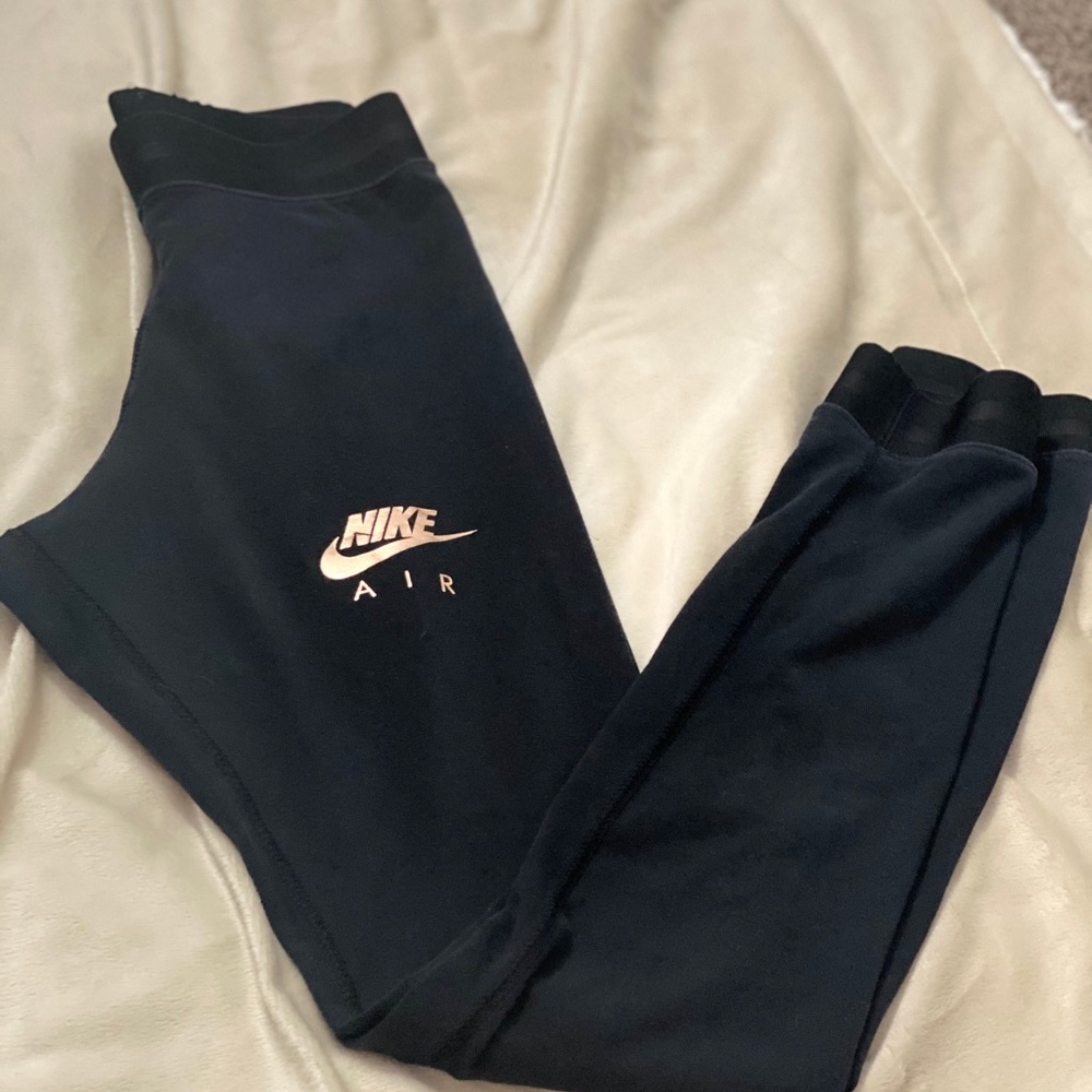Nike black and gold leggings